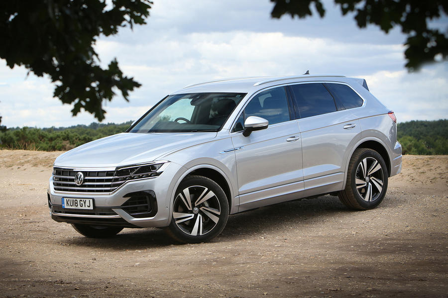 Here is the rewritten content in Chinese with only the title preserved:，Nearly new buying guide: Volkswagen Touareg，沃尔沃斯沃根第三代Touareg是一款豪华SUV，具有锋利但内敛的外观设计和豪华内饰，同时拥有出色的道路性能。，在底盘方面，Touareg与奥迪Q7和兰博基尼Urus等车型共享许多技术，虽然它不是非常轻便，但它至少尝试了轻量化。，您可以选择多种涡轮增压3.0升六缸发动